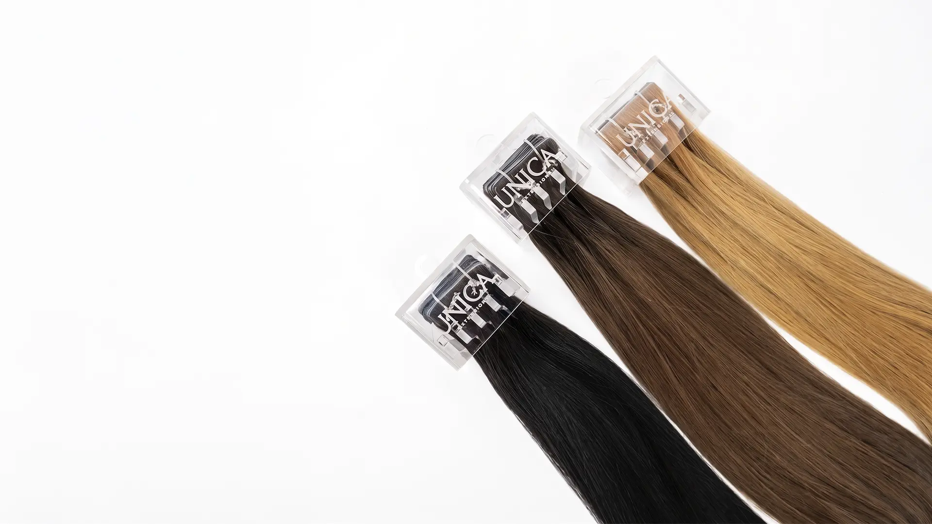 Extensiones Tape Invisible UNICA en varios tonos sobre fondo blanco
